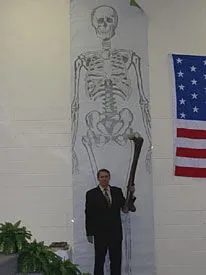 Next to a Giant's Femur: A Man Nearly 2 Meters Tall Looks Tiny Next to an Ancient Monster.