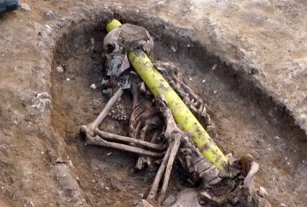 Shocking Discovery: Ancient Skeleton Sealed by Enigmatic Object Found at Anglo-Saxon Burial Site, Revealing Hidden Secrets of the Past.