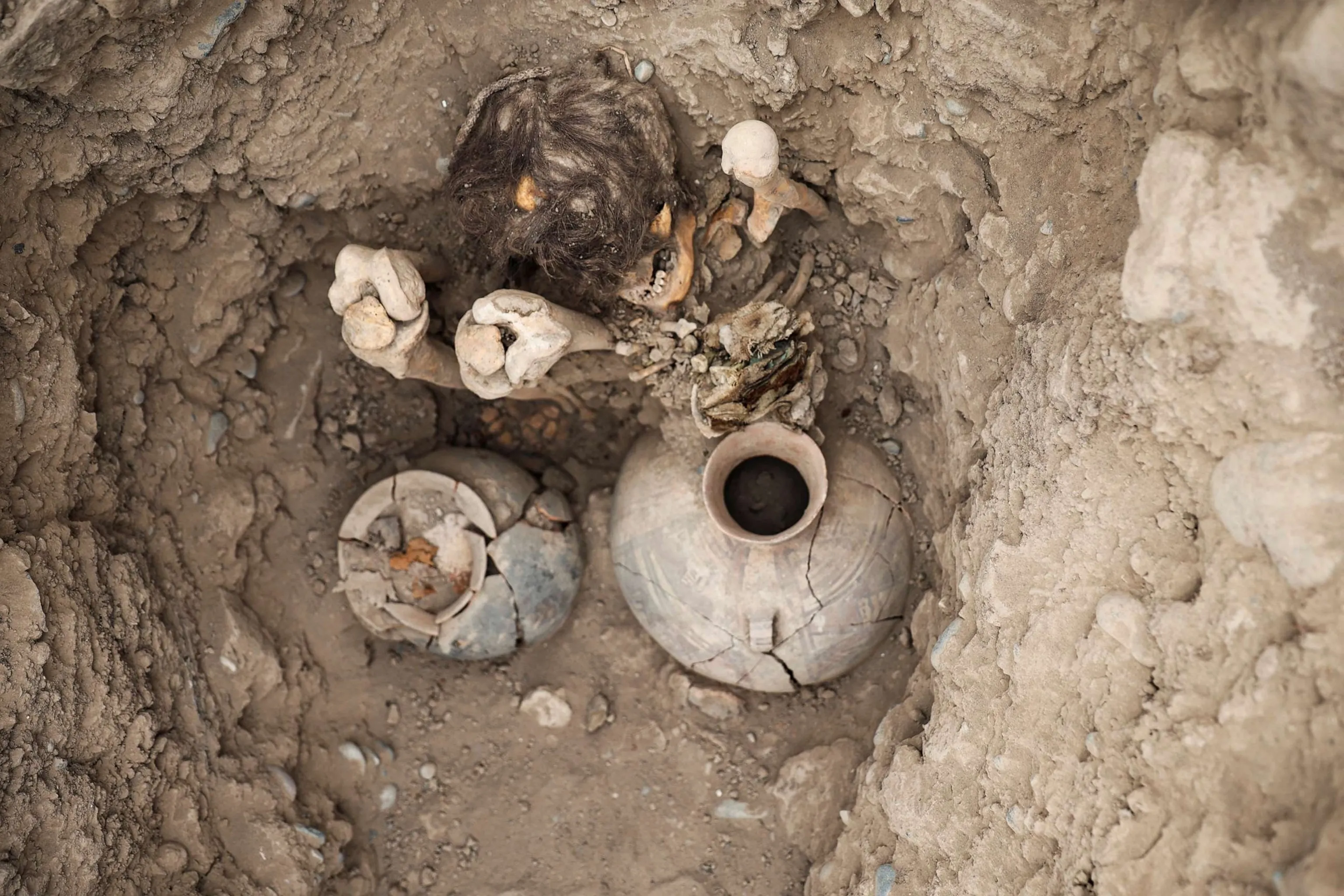 Peruvian archaeologists unearth extraordinary thousand-year-old mummy of a teenager