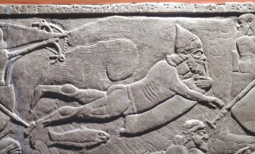 Ancient Diving Gear: 3,000-Year-Old Assyrian Carving Shows Diver Using Inflatable Goat-Skin Bag – The Oldest Record of Diving Ever Found!