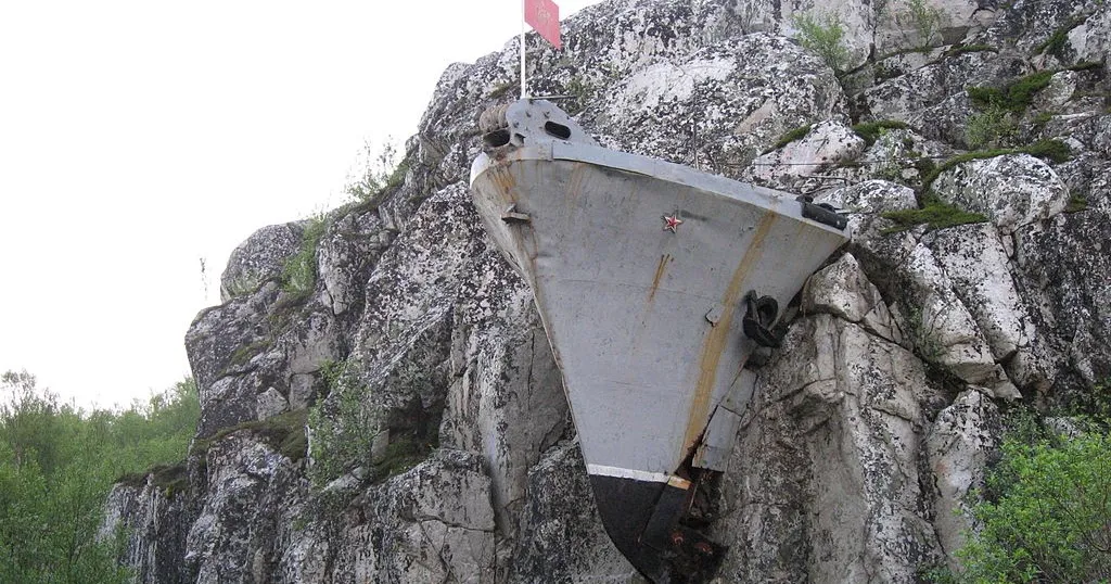 A Russian naval ship appears to be embedded in a stone mountain in Murmansk, Russia.
